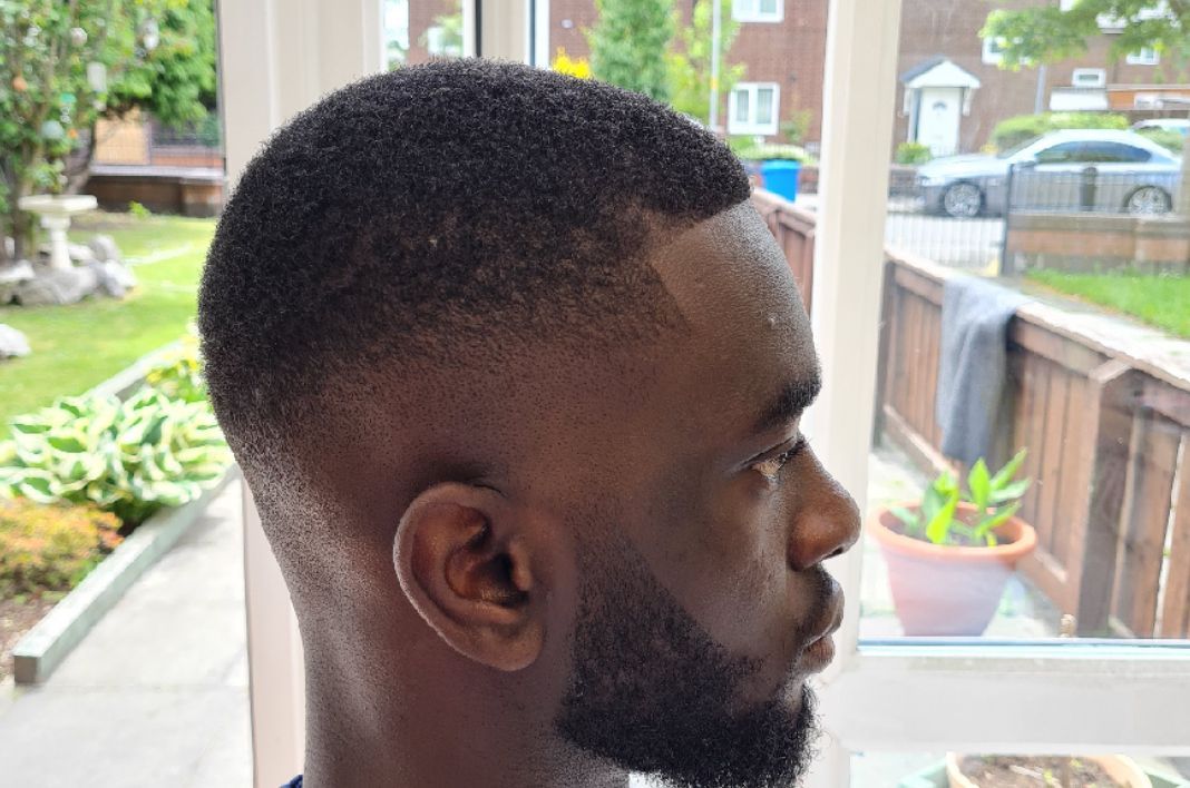 Tapered afro fade with beard